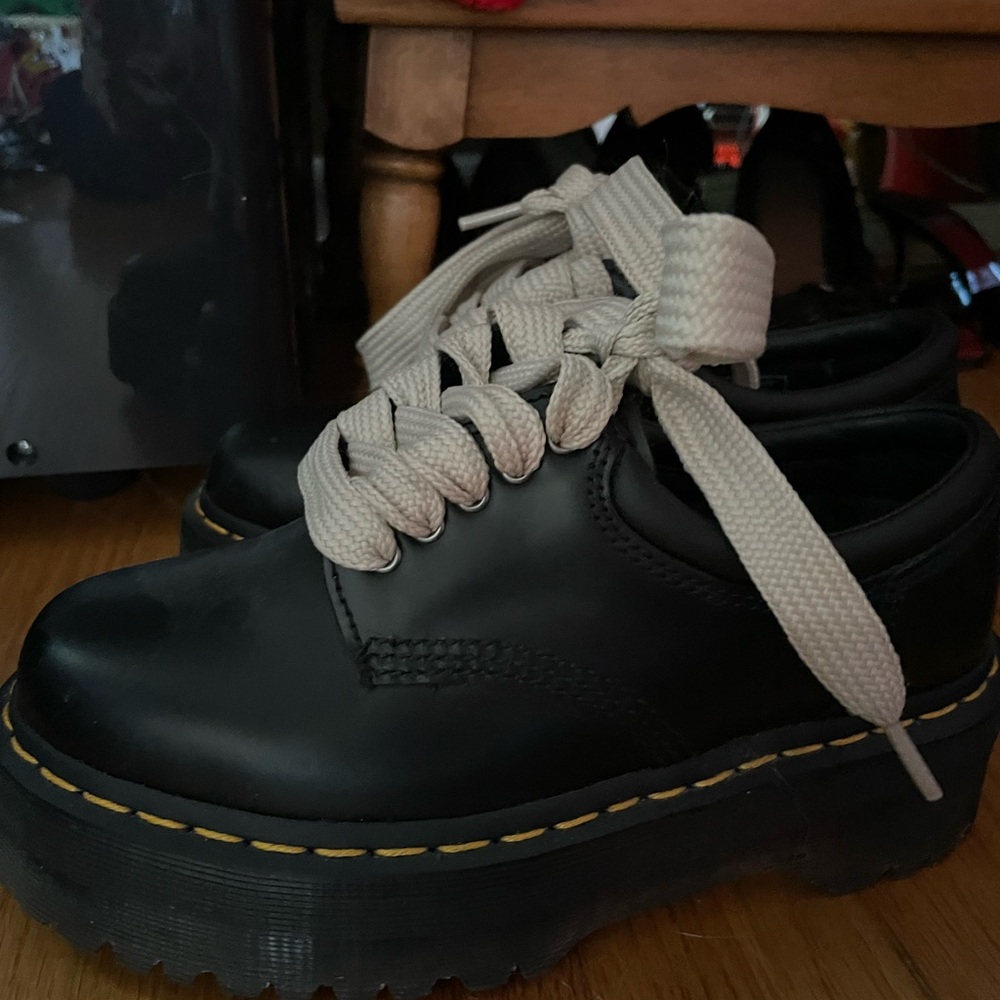 Dr. Martens Black platform shoes with thick Cream colored Laces